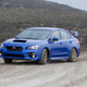 Illustration for article titled 2015 Subaru WRX STI: The Big Winged Rude Blue Rally Machine You Deserve